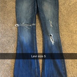 Levi's Women's Flare Jeans in Distressed Blue